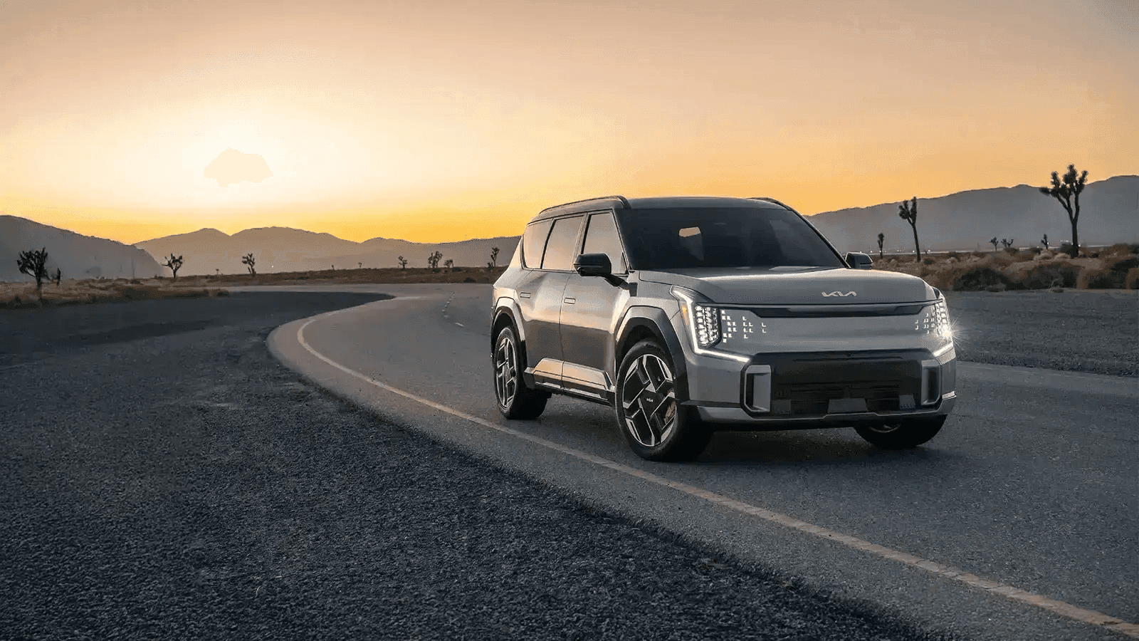 Two people watching a sunrise